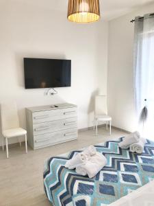 Posteľ alebo postele v izbe v ubytovaní Casa del Sole