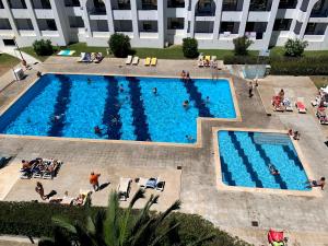an overhead view of a large swimming pool in a building at Linda Vista Mar T1, A-C, Wi-Fi, Porches in Porches