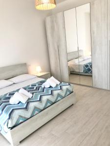 Posteľ alebo postele v izbe v ubytovaní Casa del Sole