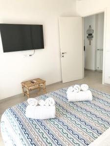 Posteľ alebo postele v izbe v ubytovaní Casa del Sole
