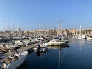 a group of boats docked in a marina at Appartement Moderne à Marseille avec Balcon et Vue sur Jardin in Marseille