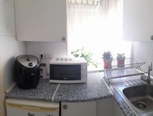 Kuchnia lub aneks kuchenny w obiekcie Monolocale