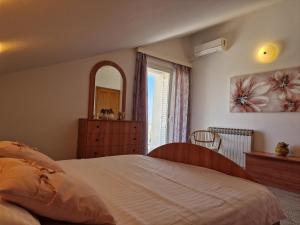 Postel nebo postele na pokoji v ubytování Holiday Home Lucija