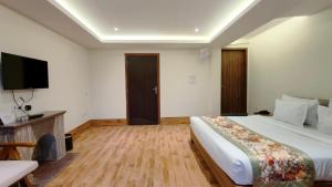 Mount Polaris Suites & Spa客房内的一张或多张床位
