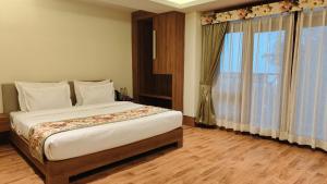Mount Polaris Suites & Spa客房内的一张或多张床位