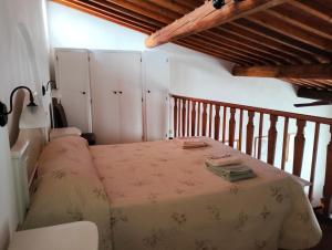 Postel nebo postele na pokoji v ubytování il nido APUS Architect Apartment