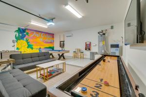 a living room with a ping pong table at Lago Vista Home with Game Room and Outdoor Tub! in Lago Vista