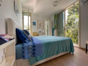 Ένα ή περισσότερα κρεβάτια σε δωμάτιο στο Zoe's villa by Turtle Bay +39 φωτογραφίες