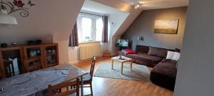 Posezení v ubytování Ferienwohnung Mäurer Leipziger Neuseenland