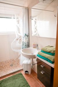 Baðherbergi á Urlaub für Mensch und Tier - Appartements Pirkhof