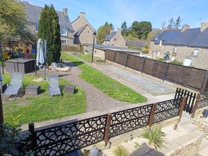Vonkajšia záhrada v ubytovaní La baie du Mont Appartement de vacances proche du Mont Saint Michel