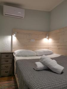 Кровать или кровати в номере Hostel Nomad