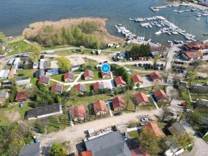 an aerial view of a small village next to a marina at Przystań Wilkasy in Wilkasy