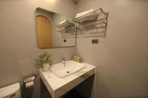 Gallery image of Secret Garden FLC Sầm Sơn in Sầm Sơn +15 photos