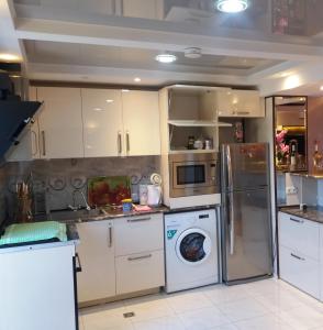 Kuchyň nebo kuchyňský kout v ubytování APARTMENT B O R A