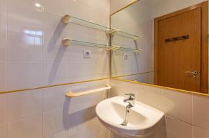 Kúpeľňa v ubytovaní SunnyApartment