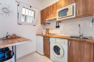 Kuchyňa alebo kuchynka v ubytovaní SunnyApartment