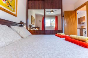 Posteľ alebo postele v izbe v ubytovaní SunnyApartment