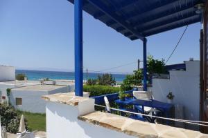 a view of the ocean from the balcony of a house at fi naxos in Agios Prokopios