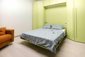 Postel nebo postele na pokoji v ubytování loft andrea costa