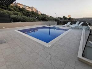Bazén v ubytování Primošten Pool Fantasy apartmant nebo v jeho okolí