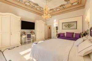 Μια τηλεόραση ή/και κέντρο ψυχαγωγίας στο Charming Apartment Cartoni
