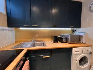 Kuchyň nebo kuchyňský kout v ubytování Fitzrovia / Bloomsbury / West End - Two Bed apt