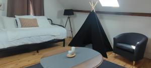 Łóżko lub łóżka w pokoju w obiekcie Lodge Loupau Maga