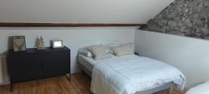 Łóżko lub łóżka w pokoju w obiekcie Lodge Loupau Maga