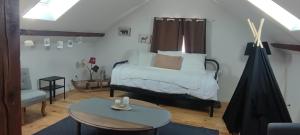 Łóżko lub łóżka w pokoju w obiekcie Lodge Loupau Maga