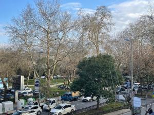 a parking lot with cars parked in a park at Bebek Parkına Bakan Daire in Istanbul