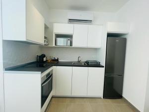 Kuchyňa alebo kuchynka v ubytovaní Apartamento Alhucemas Playa