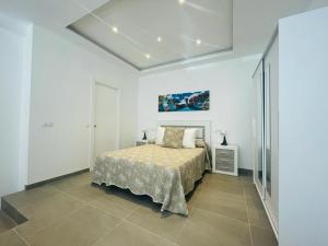 Posteľ alebo postele v izbe v ubytovaní Apartamento Alhucemas Playa