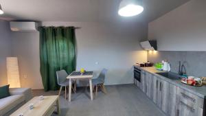 Kuchyň nebo kuchyňský kout v ubytování Jimmy's place