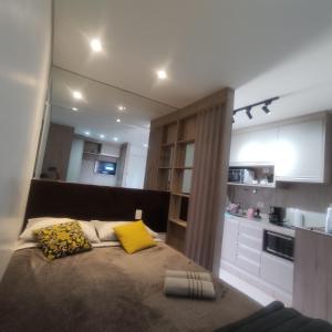 ครัวหรือมุมครัวของ Loft no centro de São Jose dos Pinhais - 10 minutos do aeroporto de Curitiba