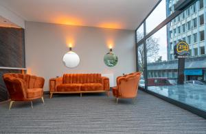 Posezení v ubytování Center Suite