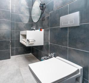 Koupelna v ubytování Center Suite