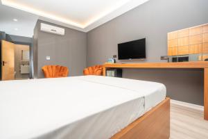 TV a/nebo společenská místnost v ubytování Center Suite