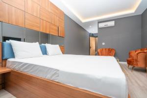 Postel nebo postele na pokoji v ubytování Center Suite