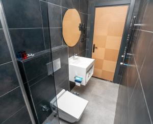 Koupelna v ubytování Center Suite