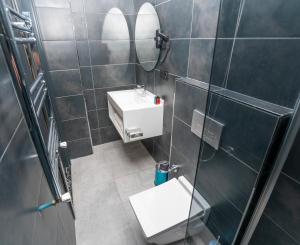 Koupelna v ubytování Center Suite