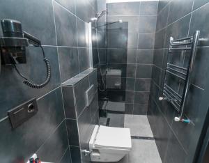 Koupelna v ubytování Center Suite