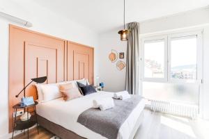 Кровать или кровати в номере Sweet Inn - Eixample Borrell