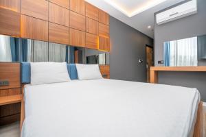 Postel nebo postele na pokoji v ubytování Center Suite