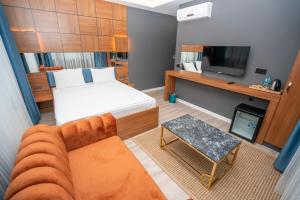 Postel nebo postele na pokoji v ubytování Center Suite