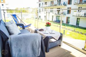 Posedenie v ubytovaní Marina Apartament 13 Iława - z prywatnym miejscem parkingowym