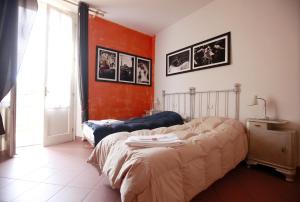 Posteľ alebo postele v izbe v ubytovaní B&B Le Lupe