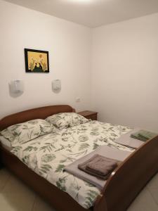 Postel nebo postele na pokoji v ubytování Apartma Praprot