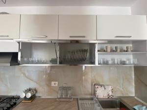 Kuchyň nebo kuchyňský kout v ubytování Kenza apartment