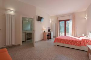 Postel nebo postele na pokoji v ubytování Le tre zie B&B